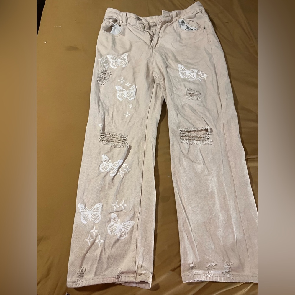 Butterfly Creme ripped jeans